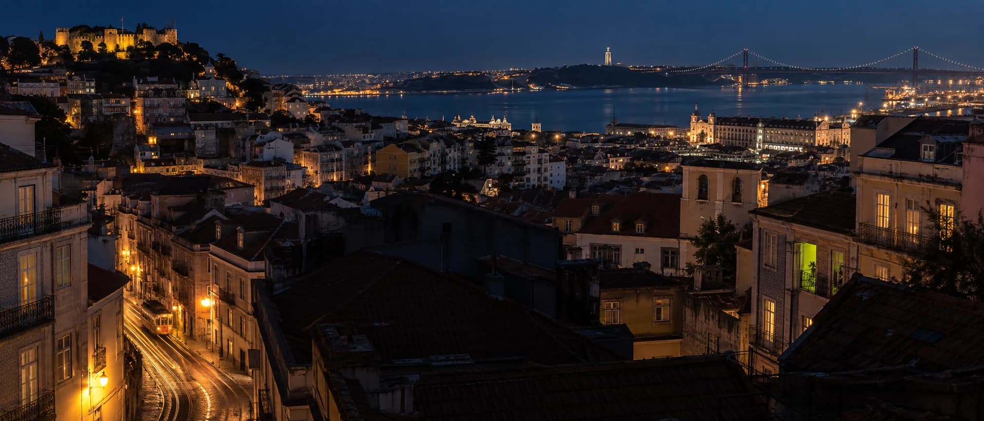 Lisbon rooftops at blue hour, amber tram trails and a lime-lit studio window above the Tagus