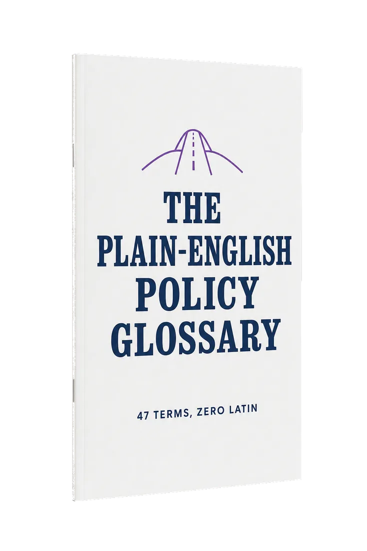 The Plain-English Policy Glossary — a slim softcover booklet, navy slab title on a white cover